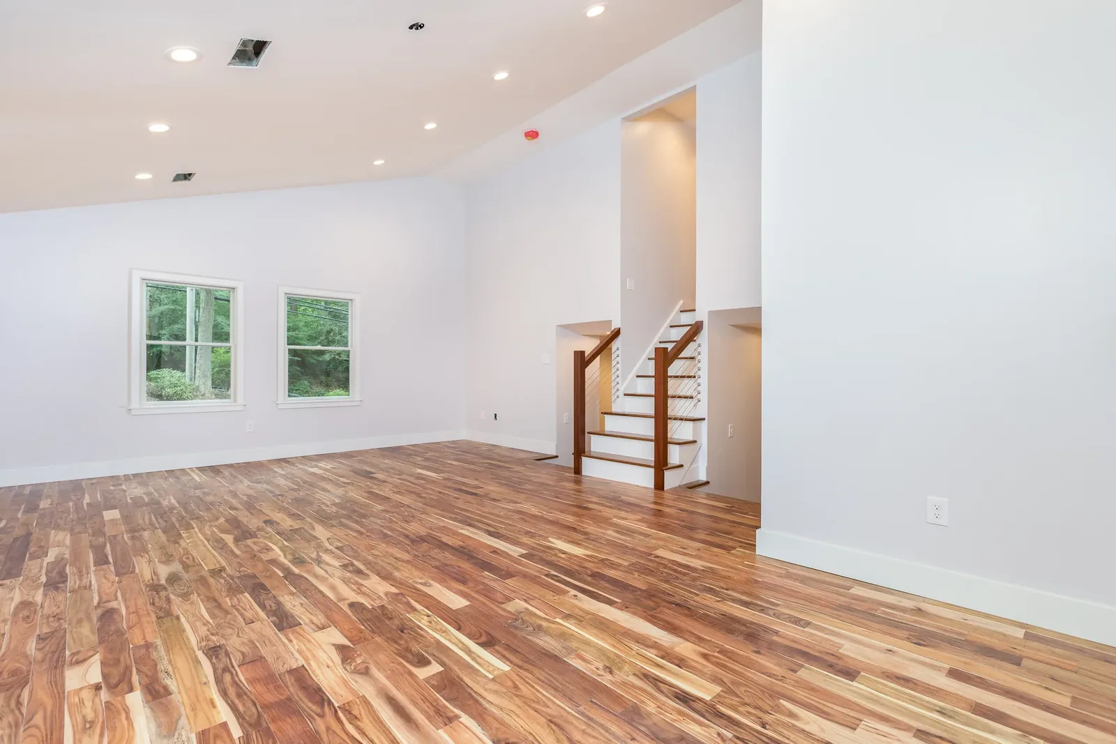 Open living area with recessed lighting