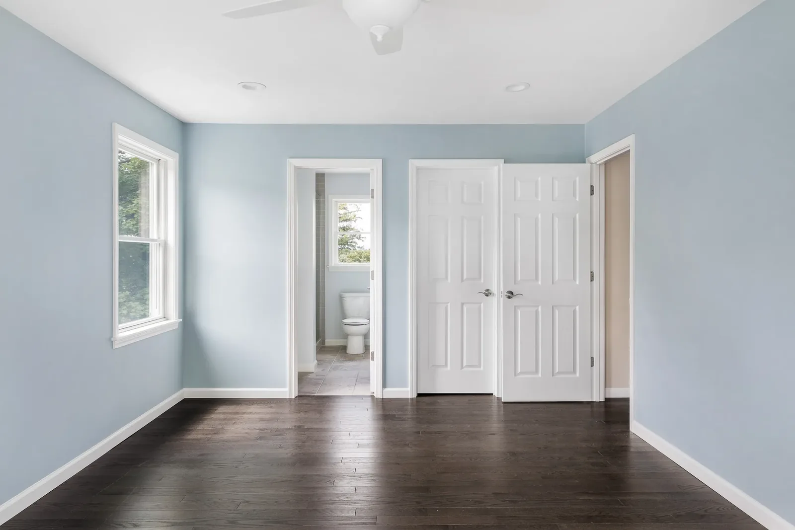 Finished lower level with wood-look floors
