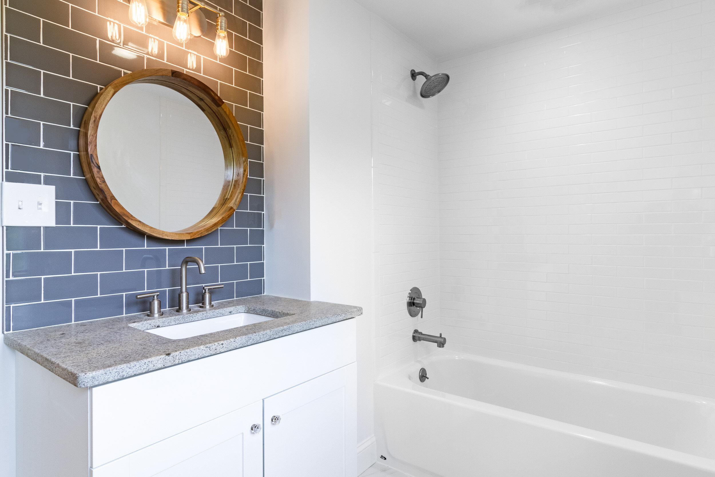 Bathroom with blue subway tile