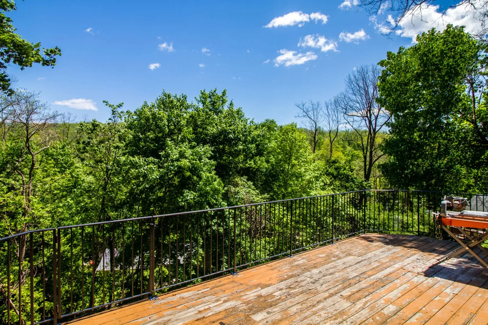 Elevated deck with valley and treetop views