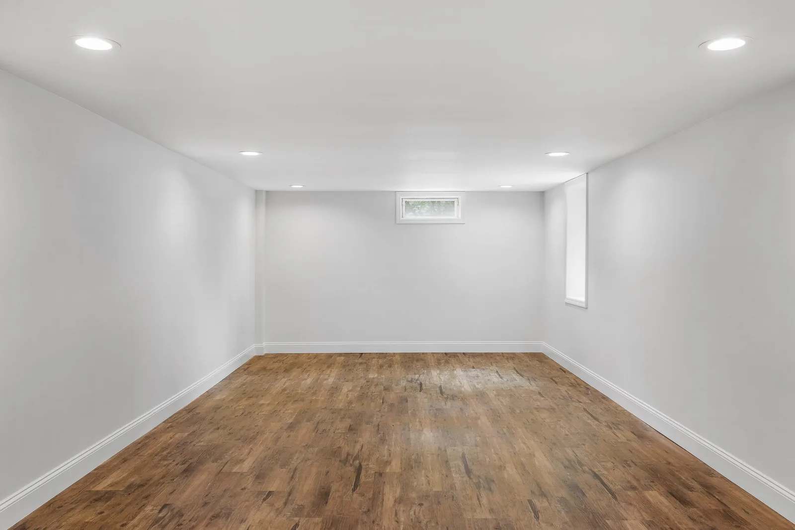 Finished lower level with recessed lighting