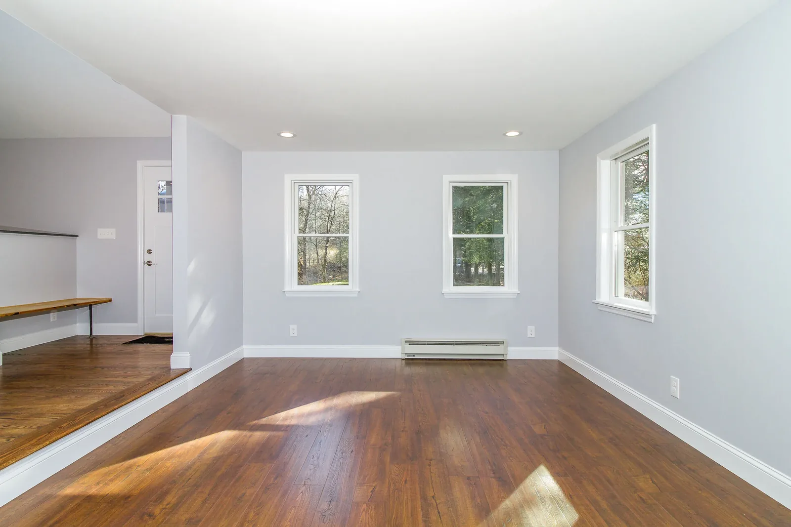 Interior with hardwood floors and abundant natural light