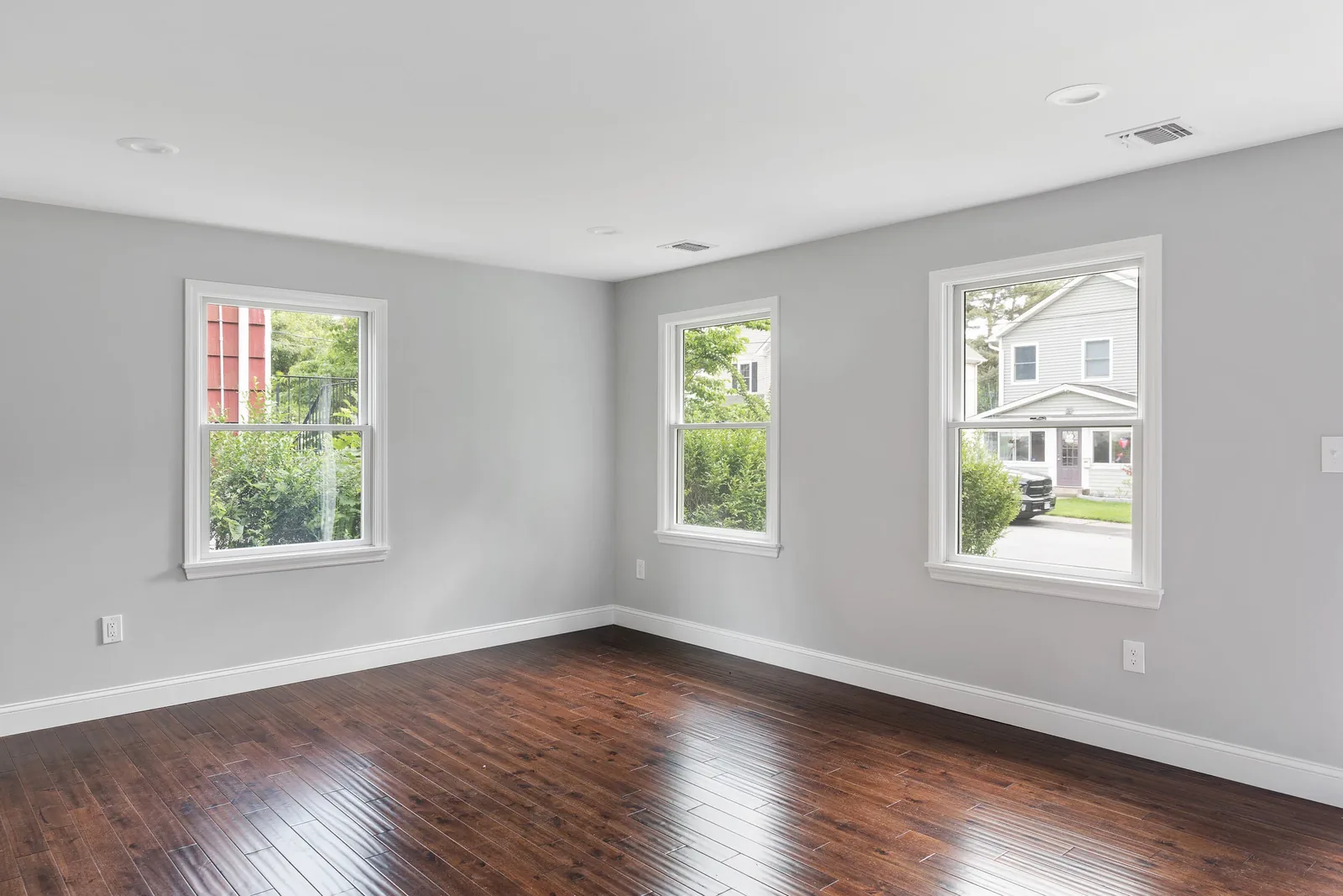 Bedroom with corner windows