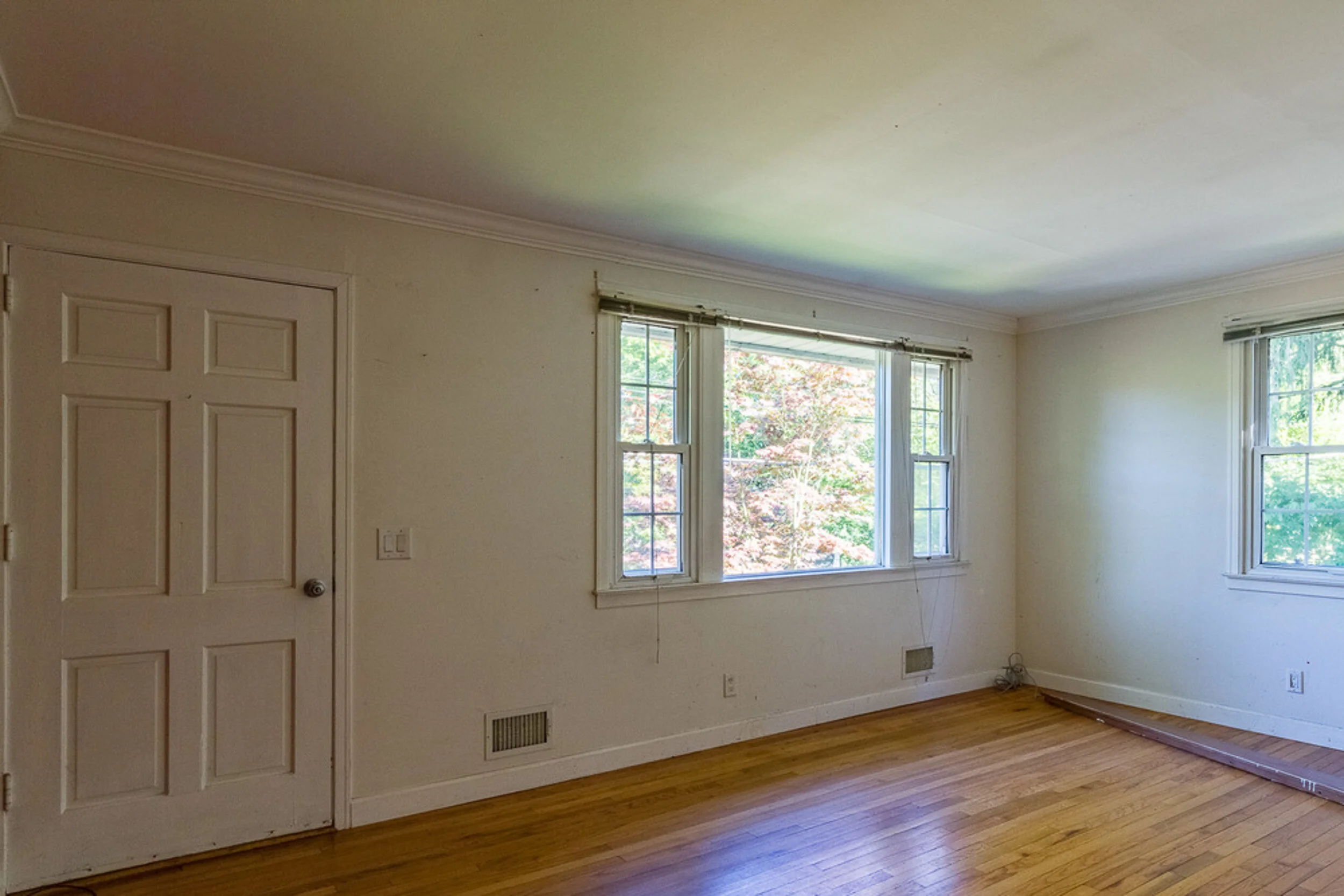 Before: living room with original windows