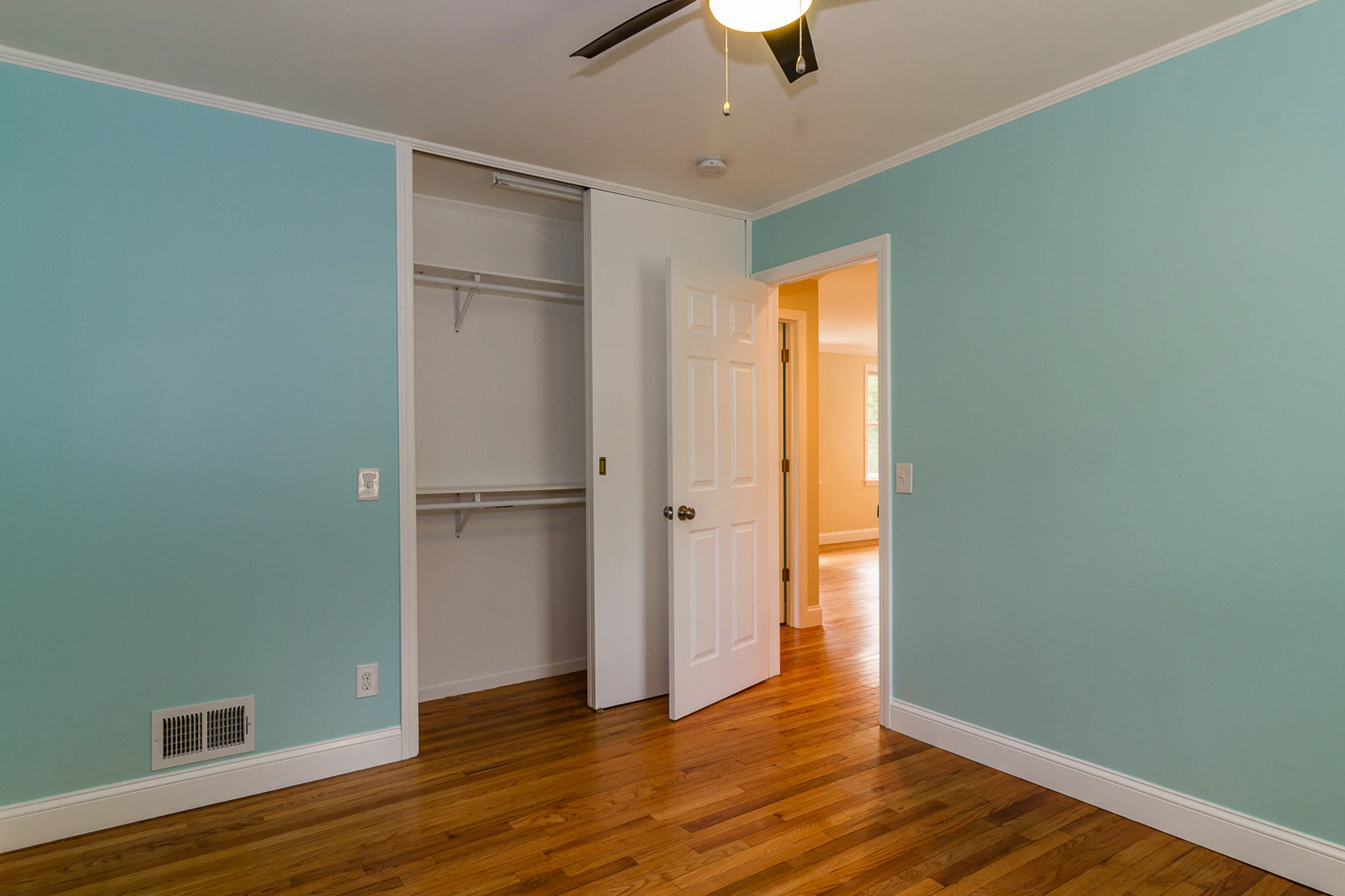 Bedroom with closet and new doors