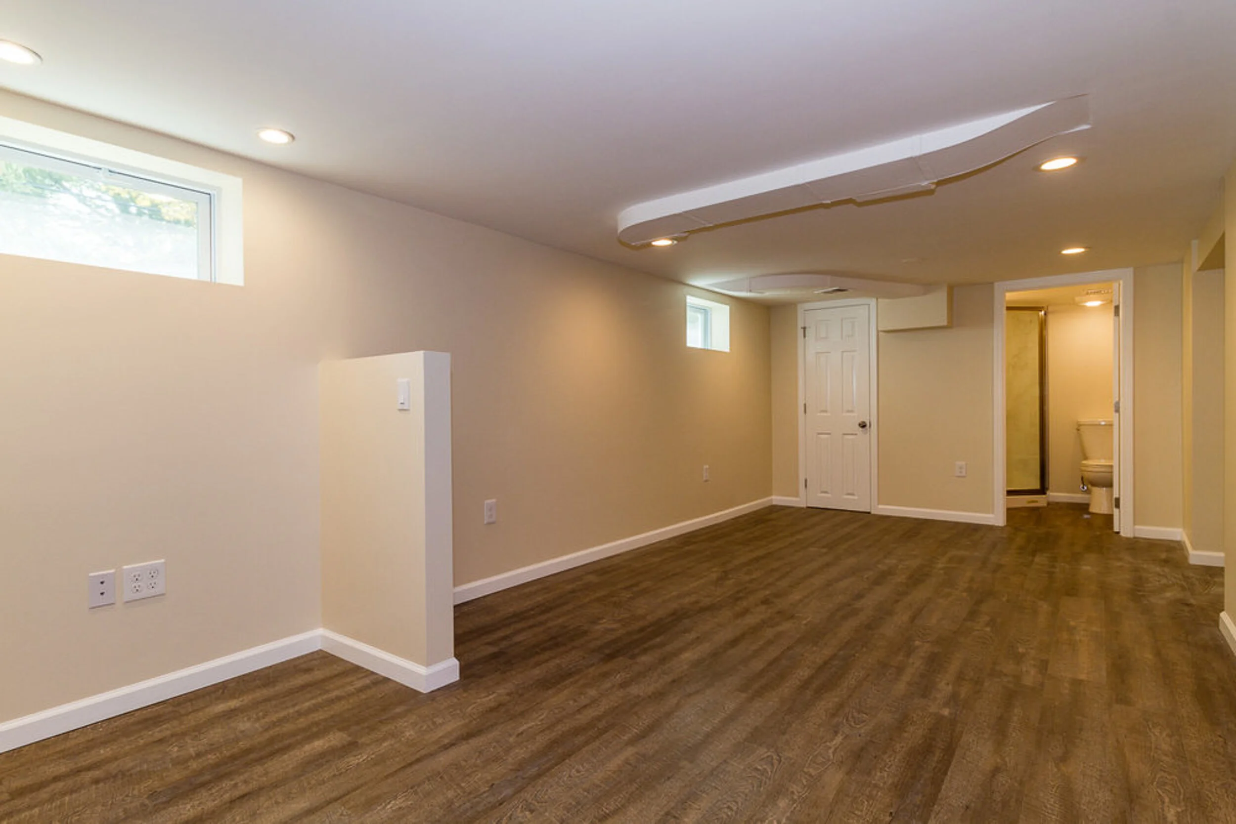 Finished basement with recessed lighting