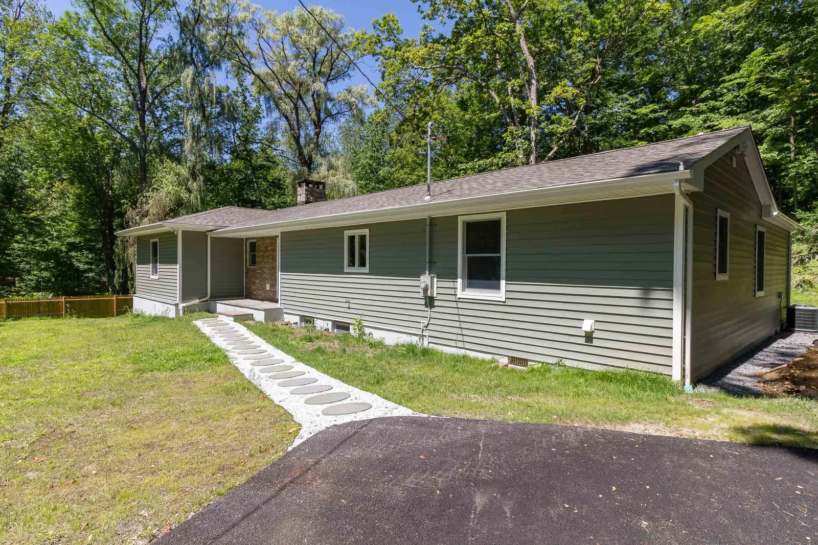 Side exterior with stepping-stone path