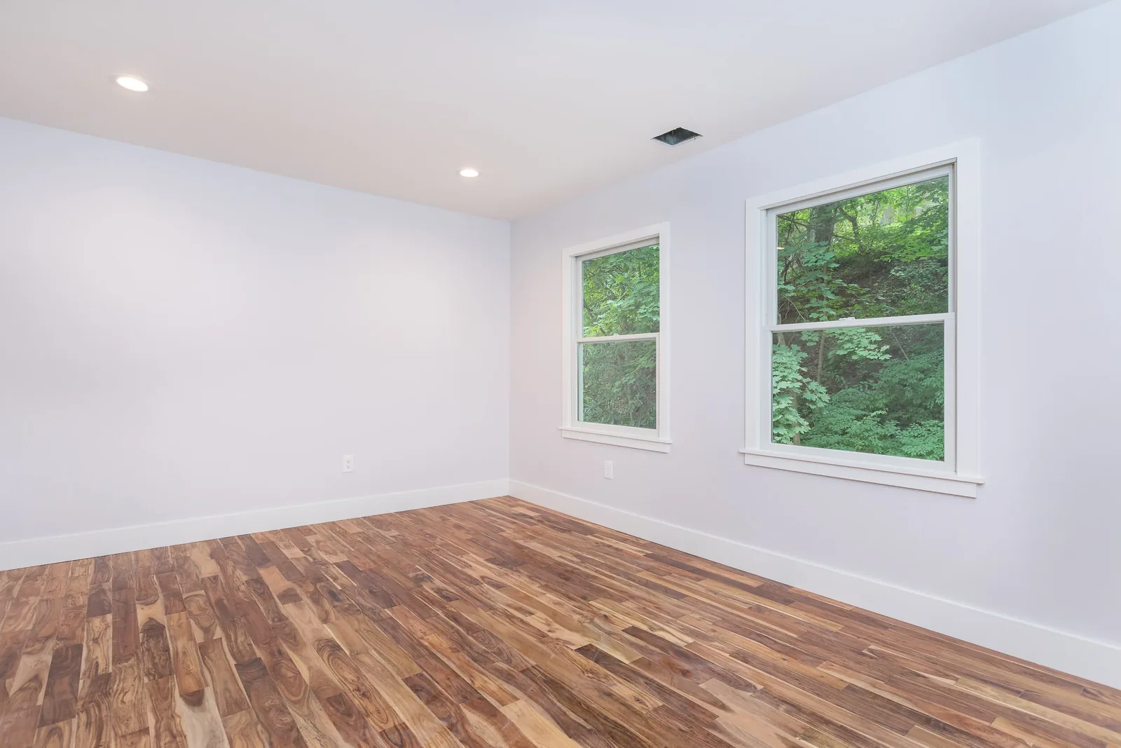 Lower level living space with craftsman entry door
