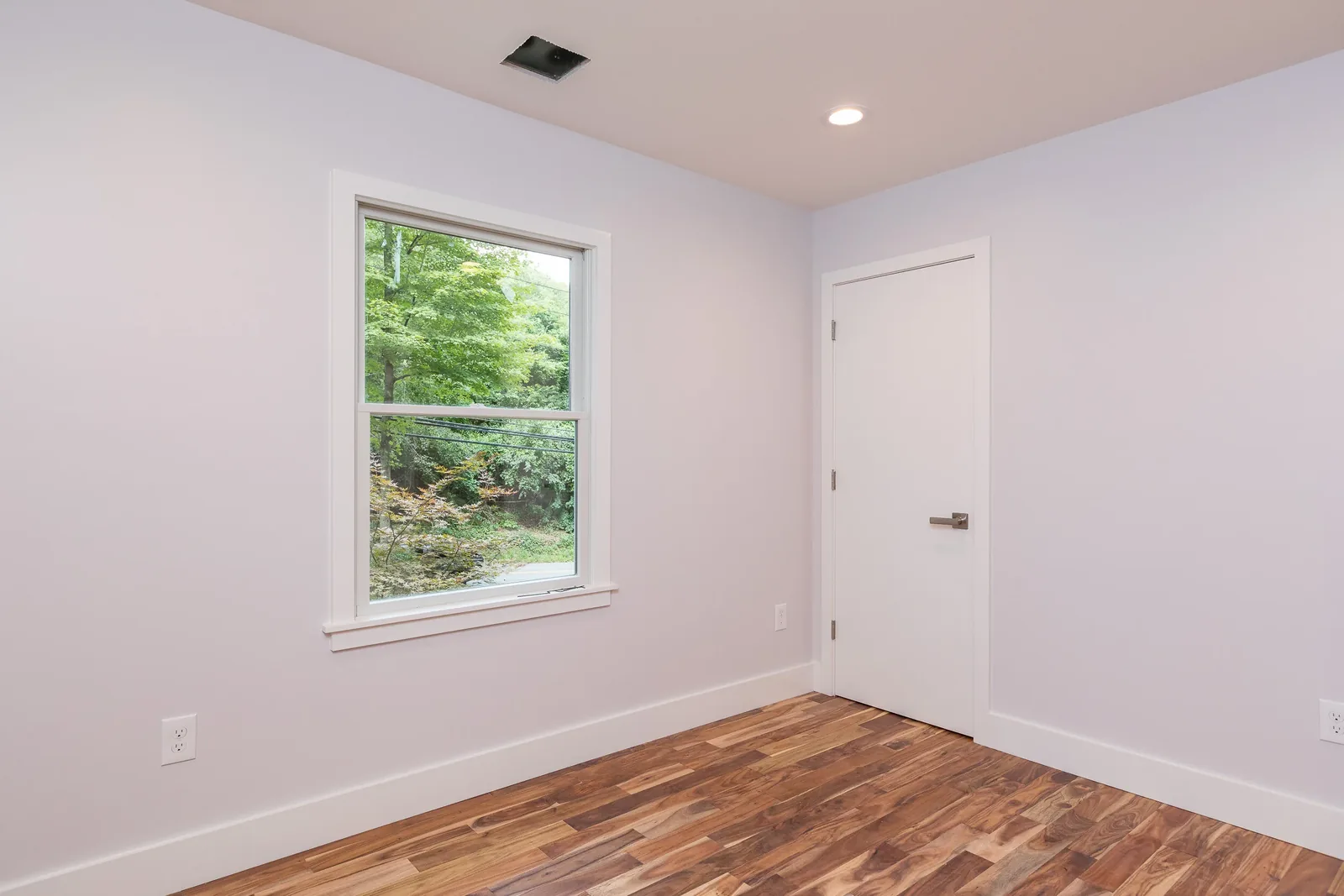 Bedroom with street-side window